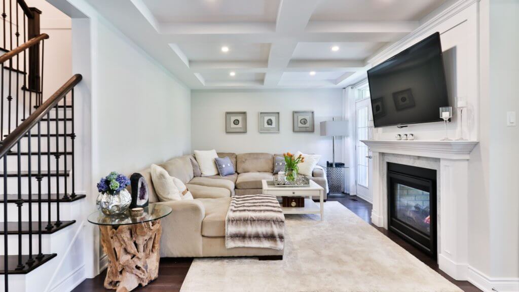 Living room with a fireplace in a stylish serviced apartment